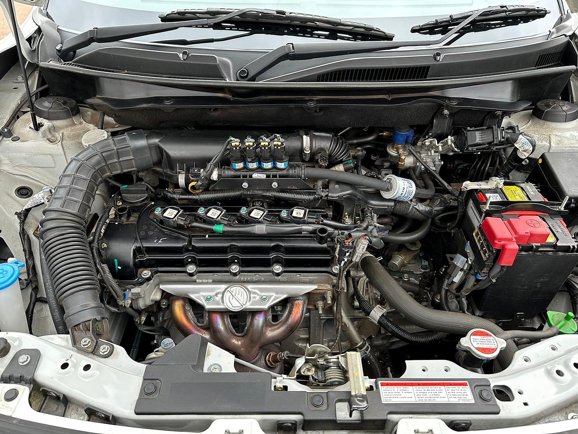 Autogas conversion kit fitted in a car's engine bay