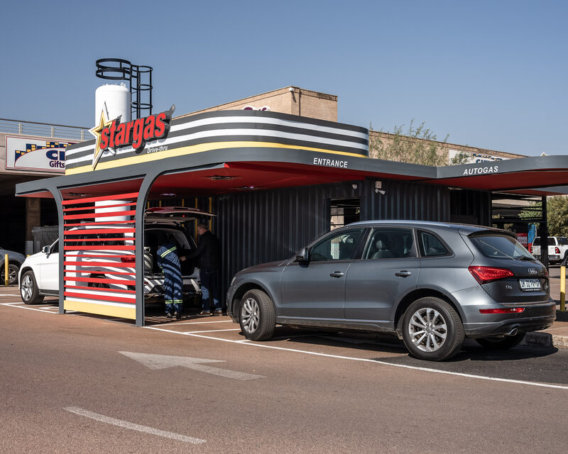 Car pulling into Stargas drive-thru